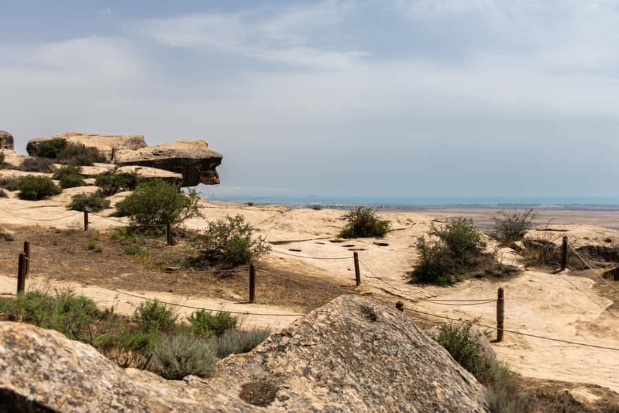Baku: Half-Day Gobustan and Mud Volcanoes Tour with Entry - Gobustan Museum of Petroglyphs: why Stone Age art feels surprisingly immediate