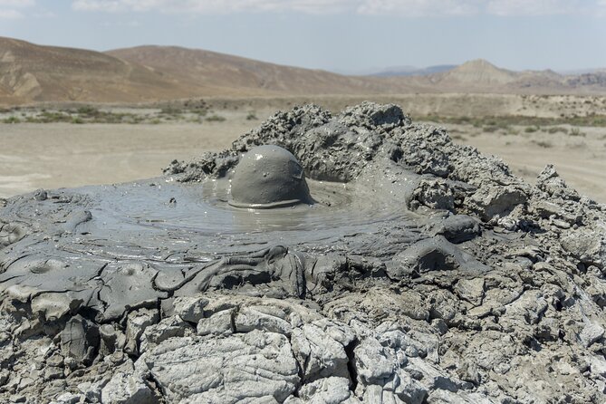 Gobustan & Mud, Fire Temple, Burning Mountain (Group & Private) - Your start in Baku Old City, plus landmark drive-bys