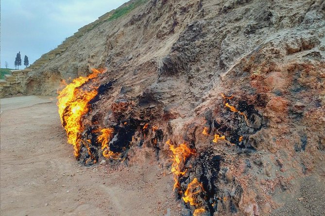 Gobustan, Mud Volcano, Burning Mountain and Fire Temple Tour - Yanar Dag Burning Land: The Flame That Keeps Going